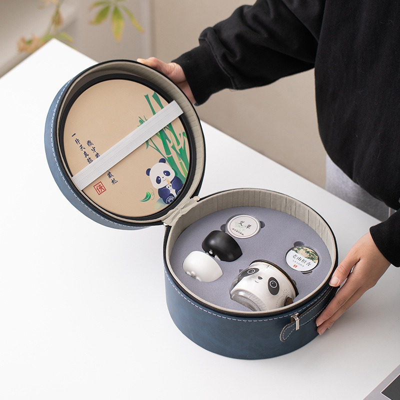 Bộ ấm trà sang trọng nhẹ nhàng phong cách dễ thương đơn giản gốm sứ túi xách du lịch ngoài trời một ấm bốn cốc ấm trà gấu trúc