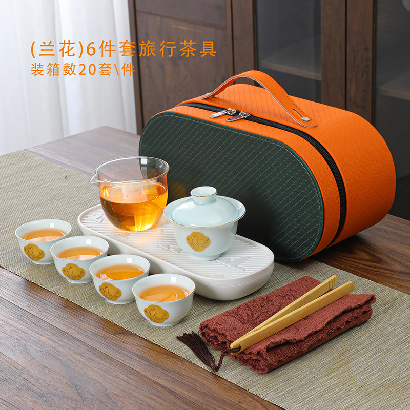 Bộ trà du lịch túi đựng đồ xách tay ngoài trời bát có nắp gốm cốc trà một ấm bốn cốc bộ nhỏ khách nhanh kinh doanh