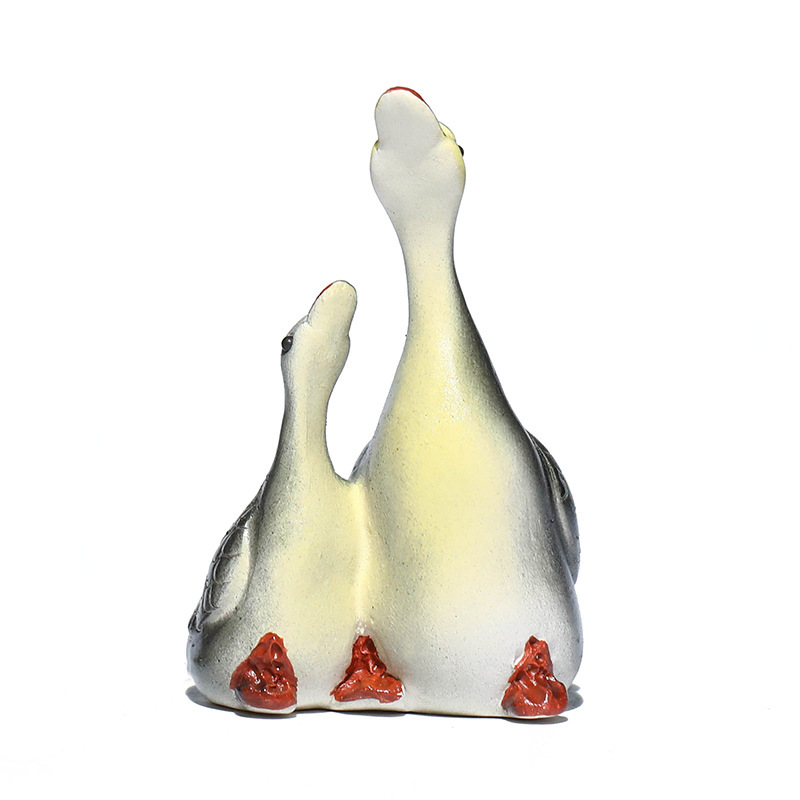 Vật nuôi trà cát tím Yixing đổi màu thiên nga điêu khắc thủ công Bộ trà đồ trang trí khay trà có thể nuôi cặp đôi ngỗng bán buôn gốm sứ