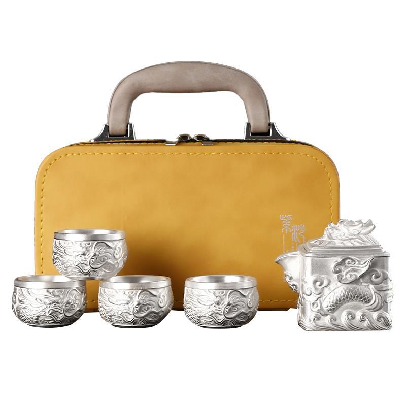 Bộ ấm trà bốn tách màu tím cát rồng bốn biển mạ bạc 999