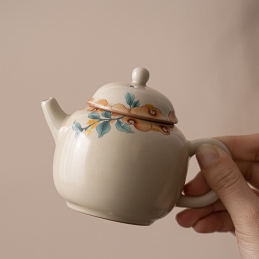 Ấm trà Ruyao màu be ấm trà gốm sứ có thể nâng cao Bộ trà Kung Fu ấm trà