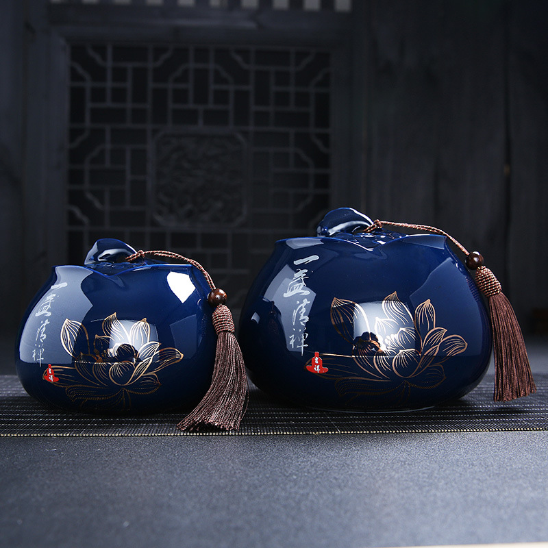 Bình trà gốm Jilan kín gia dụng nửa catty một catty retro lớn số lớn bình trà lưu trữ màu đỏ