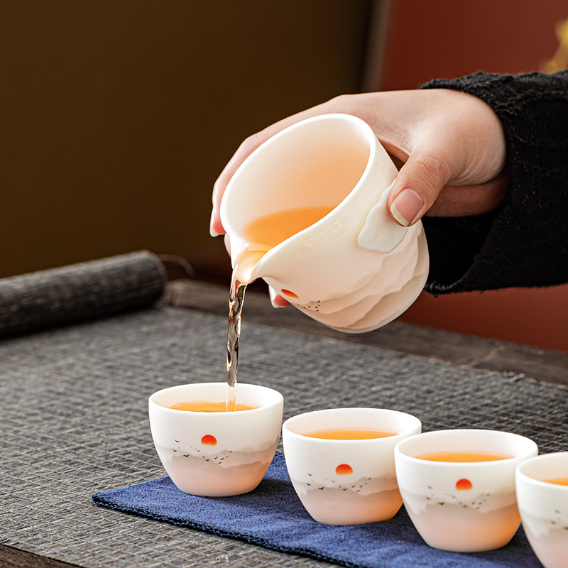 Bộ ấm trà du lịch một ấm bốn cốc gia dụng công ty hàng năm lưu niệm doanh nghiệp ấm trà gốm sứ bán buôn