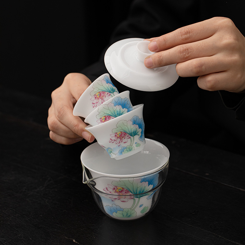 Bộ trà du lịch hoa sen bằng sứ ngọc bích phong cách Trung Quốc mới ngoài trời di động nhanh cốc gốm sứ một bát ba cốc trà