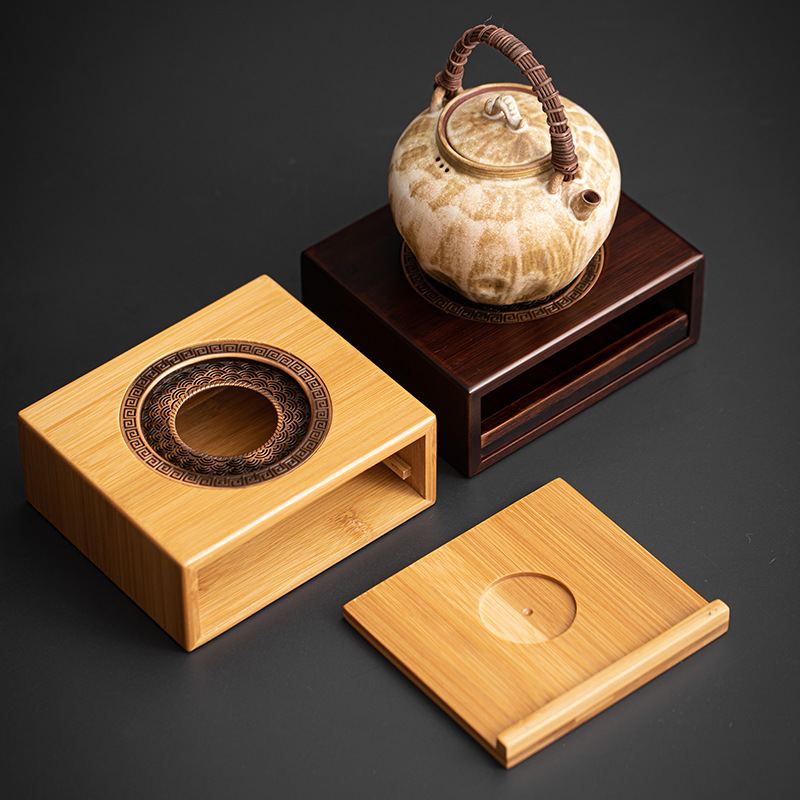 Bếp ấm trà bằng tre đế nến sưởi ấm bàn trà gia dụng ấm chén ấm chén ấm trà phụ kiện bộ trà kungfu Trung Quốc