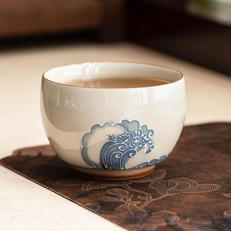 Nhà máy xếp chồng chạm khắc sóng biển La Hán tách trà gốm sứ bộ trà lớn cốc chủ nhân tách trà vẽ tay tách trà