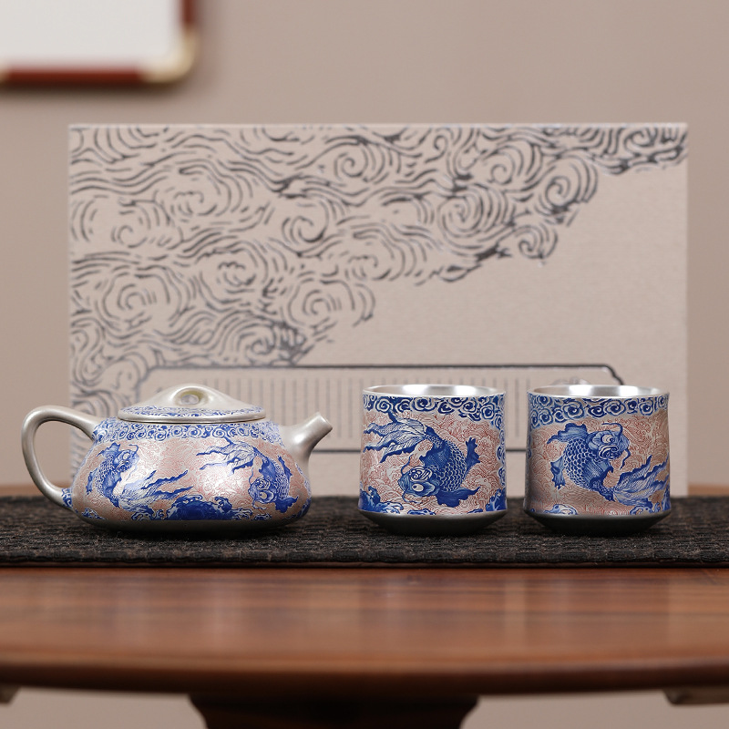 Bộ ấm chén trà Kung Fu hình cá mạ bạc, dùng trong nhà, gốm sứ cao cấp nhẹ nhàng sang trọng, gồm 1 ấm và 2 chén.