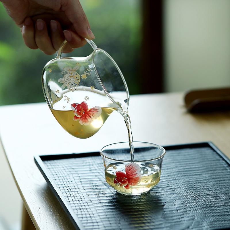 Bộ ấm chén trà bằng thủy tinh borosilicat cao cấp, dày dặn, chịu nhiệt, kèm phụ kiện pha trà kung fu, vách ngăn trà và chén đều.