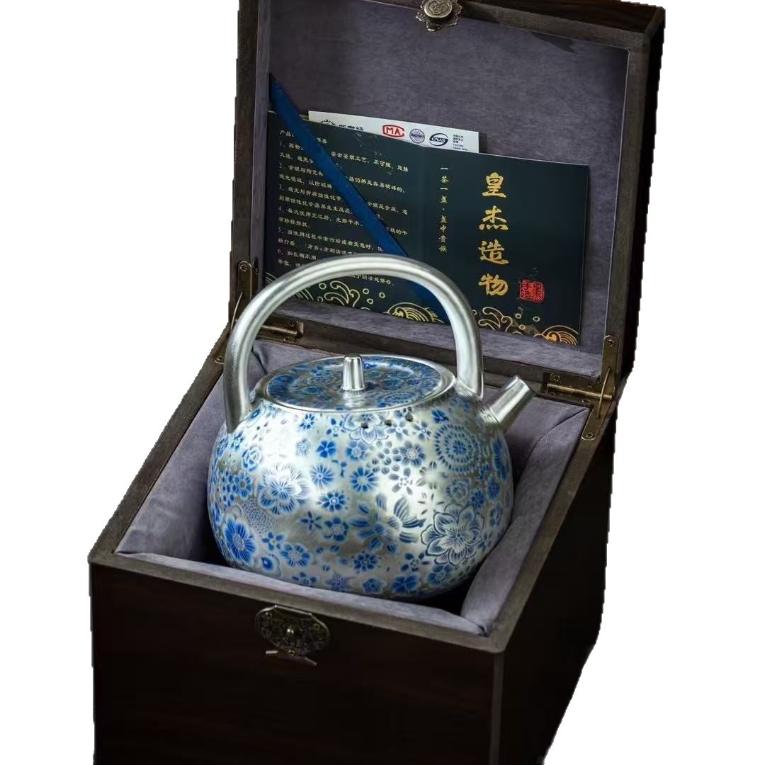 Bộ ấm chén sứ cao cấp mạ bạc, họa tiết sen xanh trắng, kèm bếp điện gốm, quà tặng dành cho người lớn tuổi.