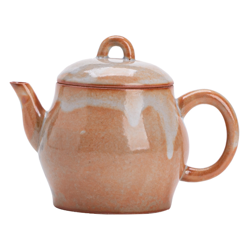 Shino-yaki hình quả lê ấm trà retro kung fu bộ trà hộ gia đình lò quay gốm bóng lỗ lọc ấm trà nồi đơn hộp quà tặng