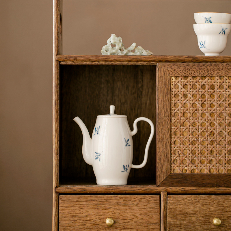 Bộ ấm trà gốm sứ trắng hoa lan bướm vẽ tay tinh khiết ấm trà gia dụng ấm pha trà có lọc bán buôn