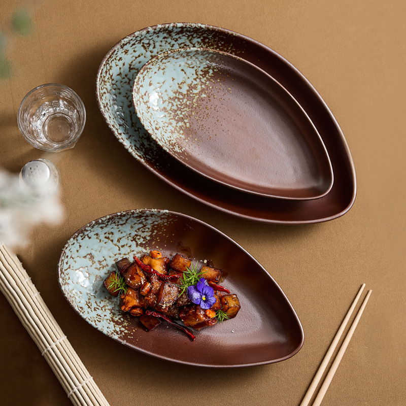 Đĩa cổ điển Dehua Đĩa thực phẩm Đĩa hình bầu dục có hình dạng đặc biệt Món ăn phân tử cảm giác cao cấp Nhật Bản Bộ đồ ăn Đĩa gốm Đĩa cá