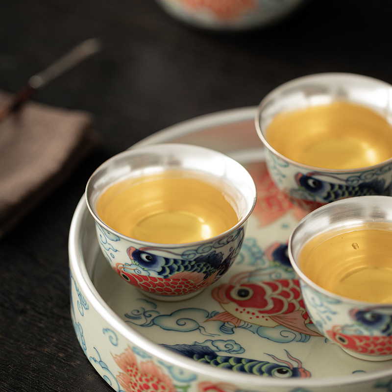 Bộ ấm trà Kung Fu gốm sứ một ấm ba chén cá rồng bạc bạc gia dụng tặng quà cho lãnh đạo và khách hàng