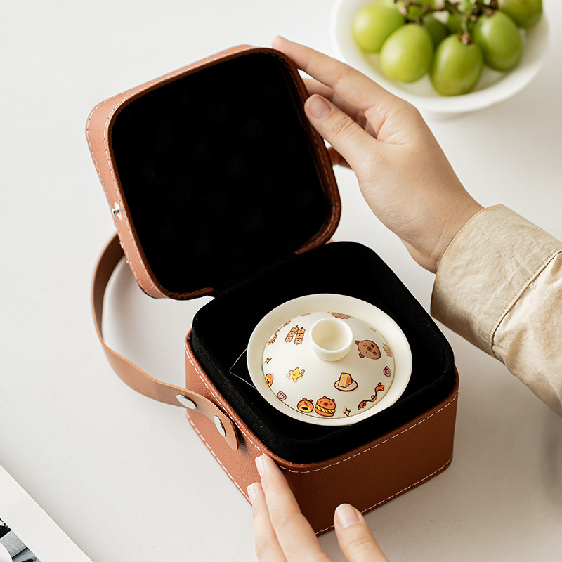 Bộ trà du lịch di động gấu trúc sáng tạo một bát ba cốc cắm trại ngoài trời gốm sứ cầm tay bình pha trà cốc khách nhanh