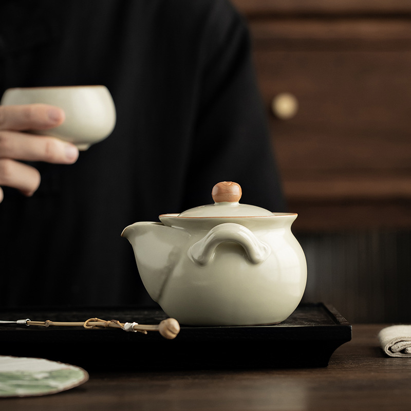 Ấm cầm tay lò Ru cổ ấm pha trà không nóng bằng gốm sứ đơn giản dụng cụ pha trà Kung Fu gia dụng có thể mở tấm ấm đơn