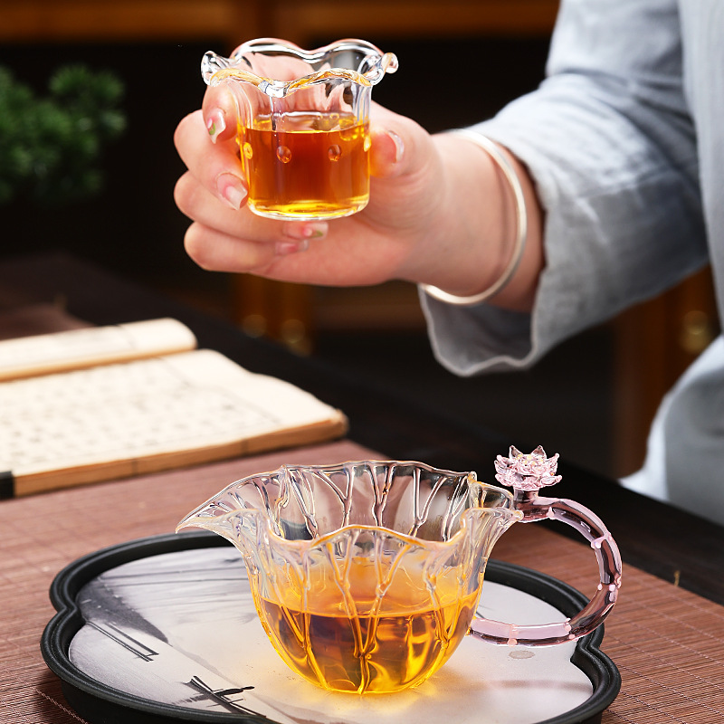 Thiết bị tách trà thủy tinh borosilicate Youmeng Tiliang Heyun Bộ trà Kung Fu gia dụng giỏ sáng tạo trà biển Youmeng Gong