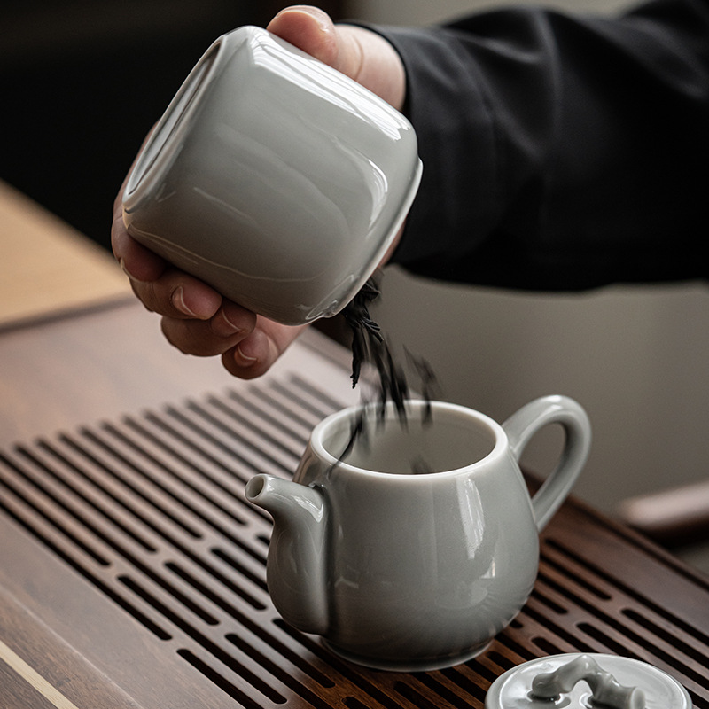 Ấm tre tráng men màu xám đá ấm trà Kung Fu gốm sứ Nhật Bản ấm đơn gia dụng Pu'er cần gấp ấm cầm tay nhỏ