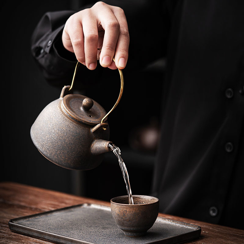 Ấm trà gốm sứ gia dụng ấm trà có dầm lọc cổ điển kiểu Trung Quốc ấm trà bộ trà công phu ấm trà ấm trà một ấm bán buôn