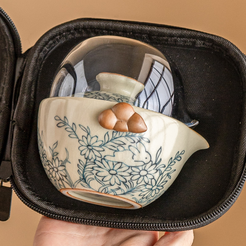 Hoa hướng dương Mengtu Ru lò một bình hai cốc bộ ấm trà du lịch ngoài trời di động ấm trà gốm sứ kiểu Trung Quốc