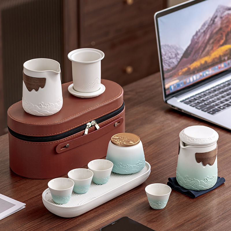 Bộ trà du lịch kiểu Nhật Bộ trà Kung Fu một ấm bốn cốc cốc khách nhanh ngoài trời cao cấp hiện đại đơn giản xách tay