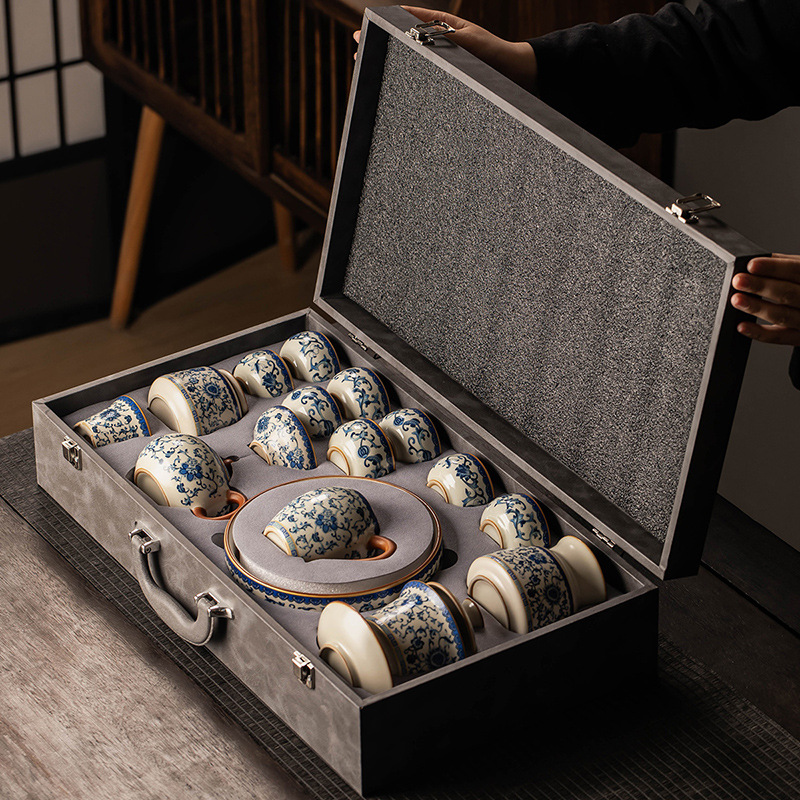 Bộ đồ trà lò vàng xanh trắng ấm trà gốm sứ cao cấp sang trọng nhẹ gia dụng cốc trà Kung Fu trọn bộ quà lưu niệm