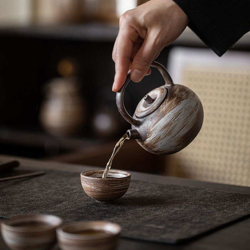 Ấm trà cầm dầm tròn cổ điển gốm thô thủ công ấm trà pha hồng đơn giản kiểu Nhật ấm trà dụng cụ trà Kungfu gia dụng ấm đơn