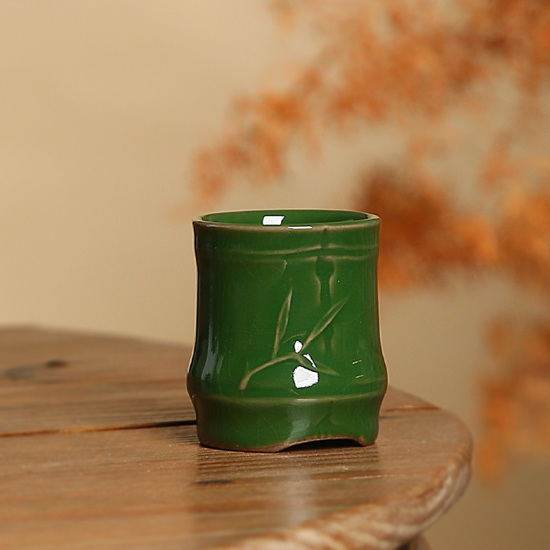 Bộ ấm chén trà tre xanh Zhuang Chui Renlang, chén chủ, chén khách, chống nóng, kiểu dáng mới Trung Quốc sáng tạo.