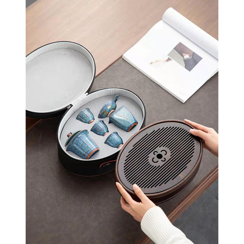 Dayuan Zhang Jinxi nổi ngọc bích màu xanh ngọc bích gốm sứ du lịch di động ngoài trời ấm trứng rồng tinh tế bộ trà nhỏ bộ quà tặng