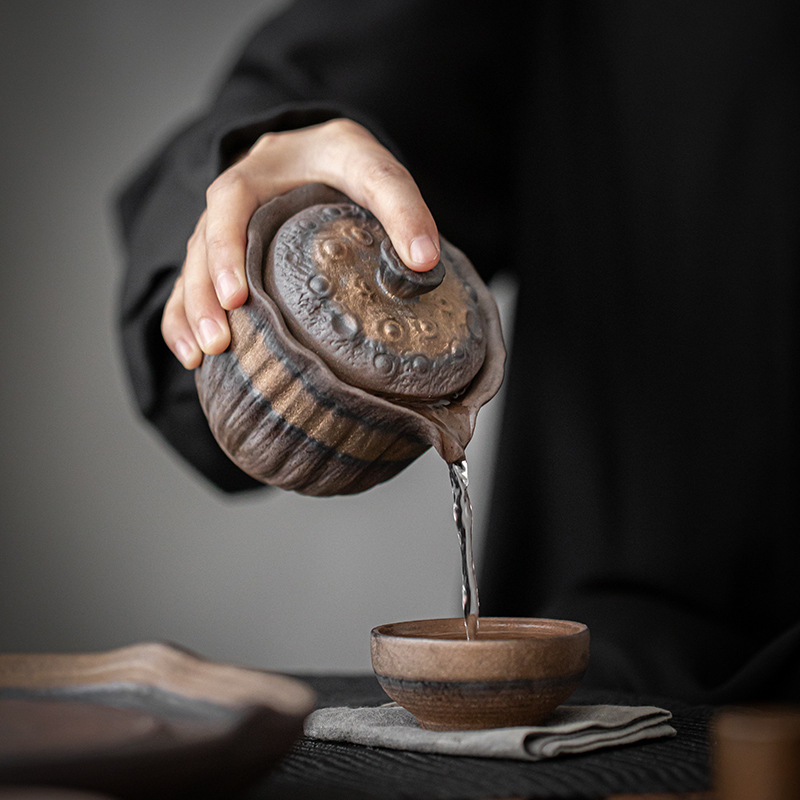 Bán buôn ấm cầm tay hoa sen mạ vàng gốm thô ấm pha trà Thiền gia dụng cổ điển thủ công có bộ lọc Bát Trà chống bỏng