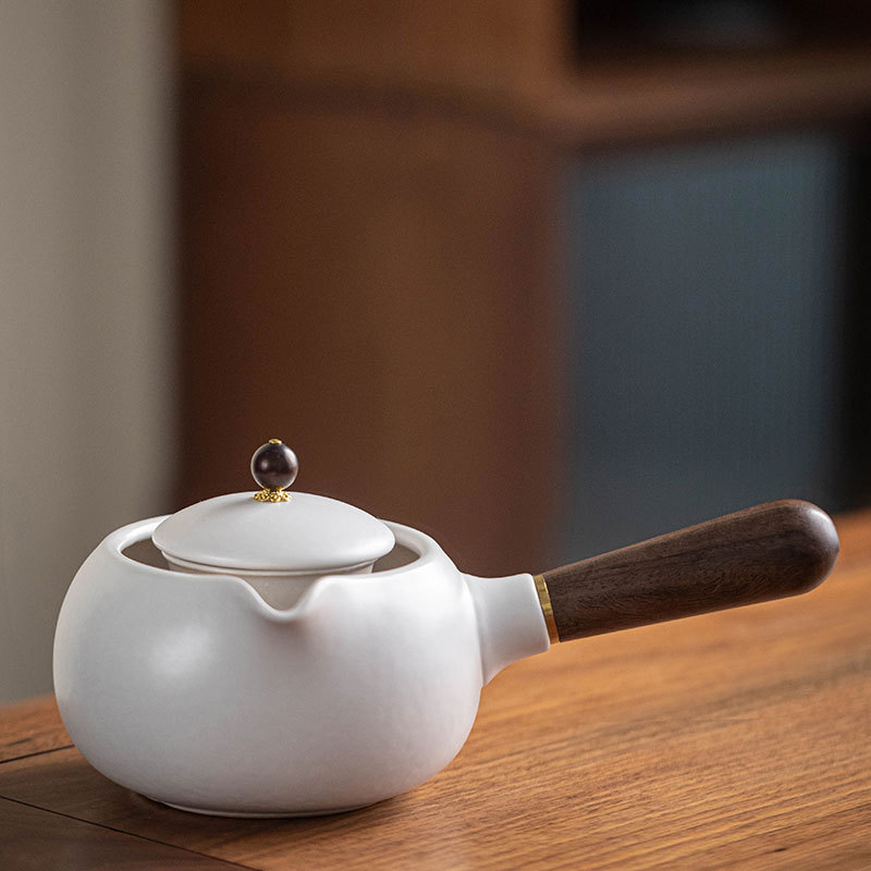Ấm đun trà bên hông Jinghong ấm pha trà ấm pha trà ấm pha trà gốm sứ bên hông gỗ rắn cổ điển ấm đun nước lớn