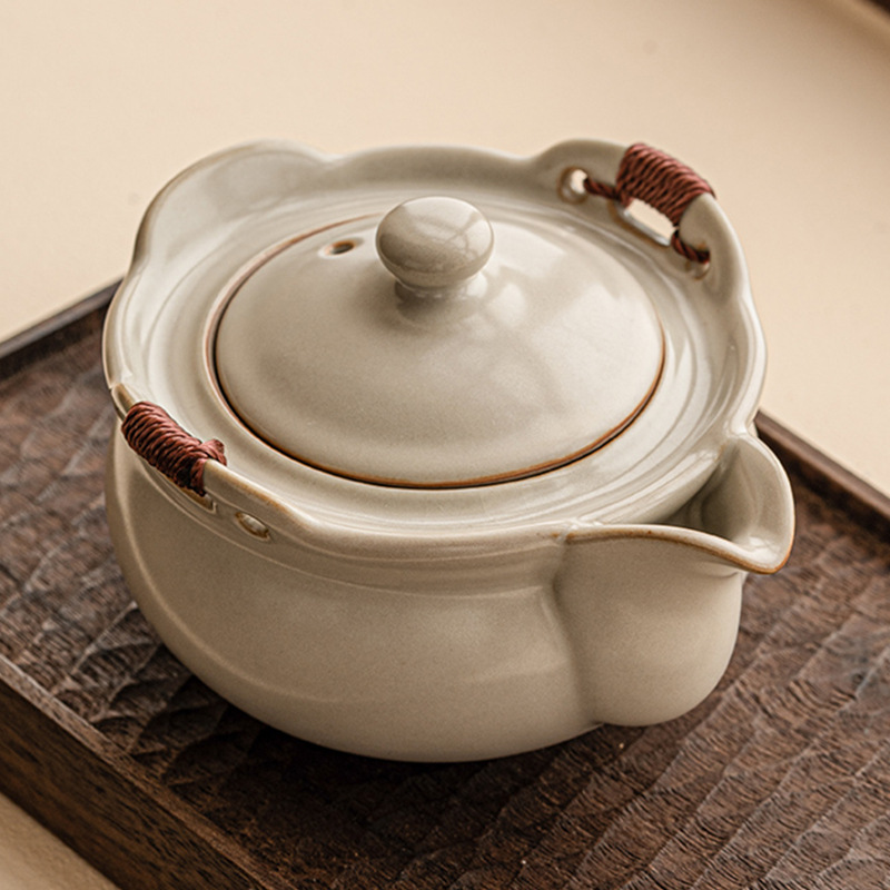 Ấm cầm tay Ru Kiln màu vàng be ấm pha trà gốm sứ cao cấp một bộ trà Kung Fu gia dụng chống bỏng ấm đơn có nắp