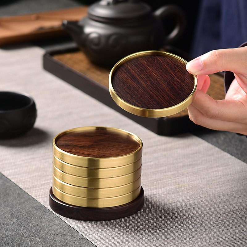 Đế cốc trà bằng đồng nguyên chất đế cốc gỗ mun dụng cụ trà kungfu gia dụng phụ kiện trà đạo bán buôn thảm trà cách nhiệt bằng gỗ nguyên khối