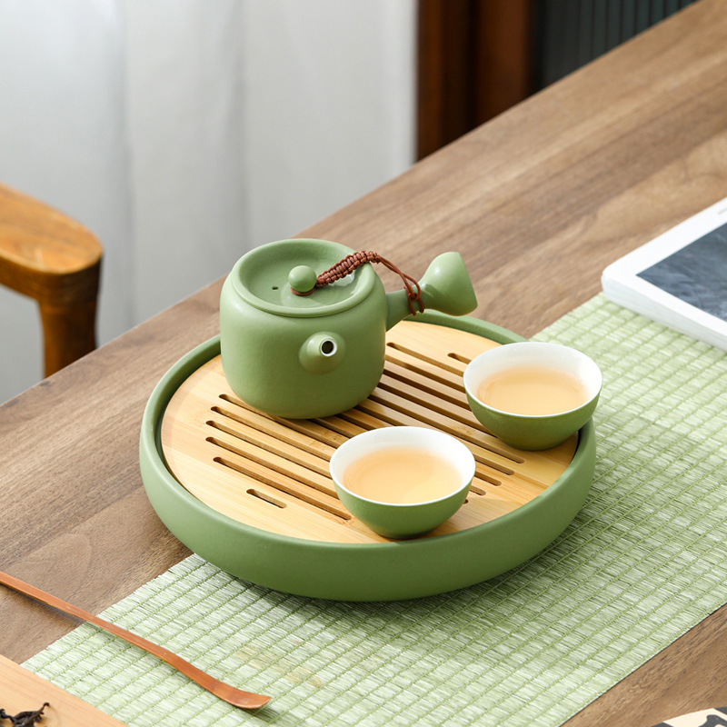Bộ ấm trà Kung Fu hai cốc Xiaoqingxinyiqing kiểu Trung Quốc gia dụng cao cấp văn phòng họp bàn trà nắp bát bán buôn