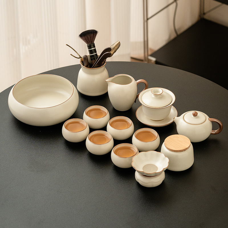 Bộ ấm chén trà Ru Kiln màu be 2025 mới, kiểu dáng đơn giản, dùng trong gia đình, gồm ấm trà Kung Fu có nắp, chén, chén trà và hộp đựng trà.