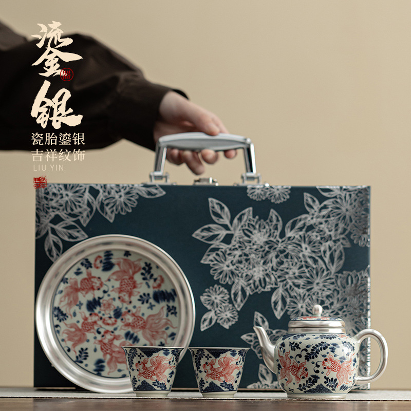 Bộ trà một ấm hai tách cá bạc chơi trong nước Bộ trà gốm sứ gia dụng Trung Quốc tặng quà doanh nghiệp cho người lớn tuổi