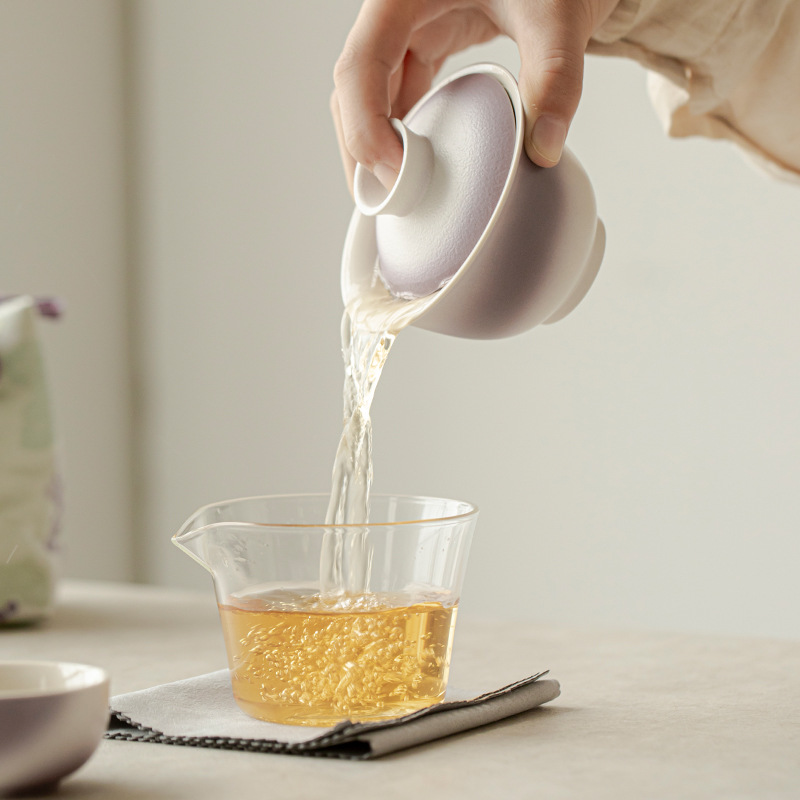 Bộ trà du lịch gốm sứ Chupu một ấm hai cốc ngoài trời đựng túi vải lưu trữ quà lưu niệm sáng tạo kiểu Trung Quốc
