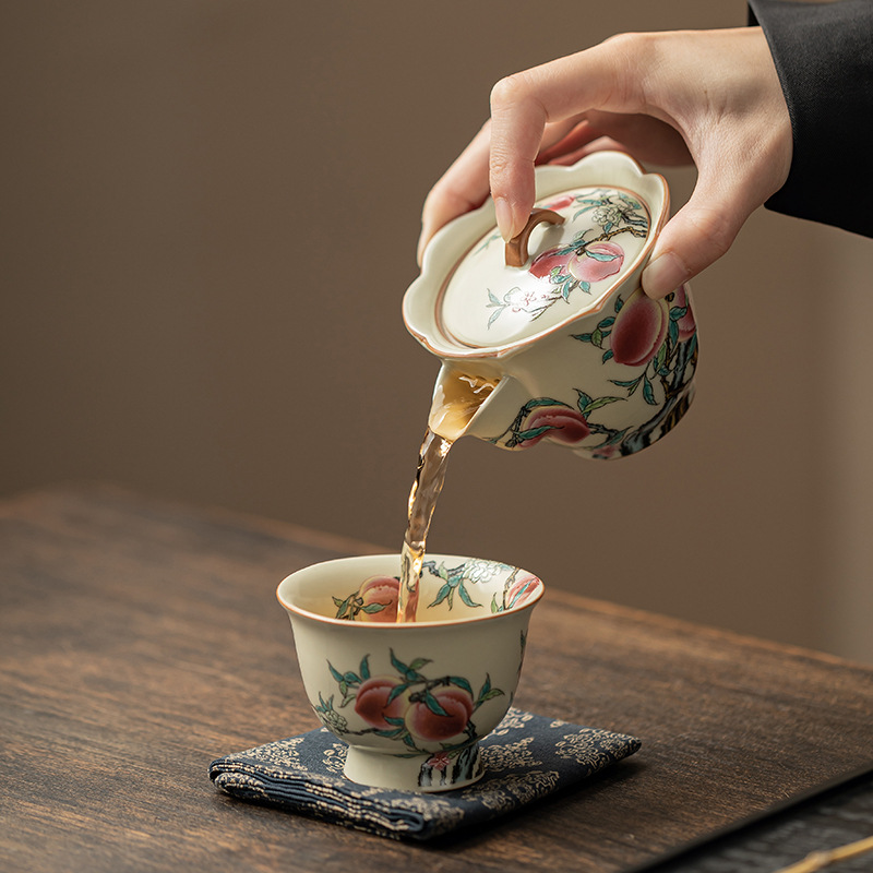 Ấm cầm tay miệng chín hoa đào kiểu Trung Quốc Ấm trà gốm sứ Ru Kiln Bộ ấm trà Kung Fu có thể dùng để đựng hộp quà ấm đơn thủ công gia dụng