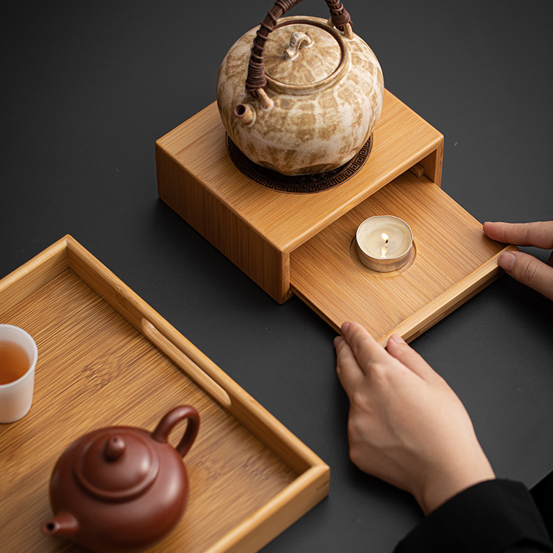Bếp ấm trà bằng tre đế nến sưởi ấm bàn trà gia dụng ấm chén ấm chén ấm trà phụ kiện bộ trà kungfu Trung Quốc