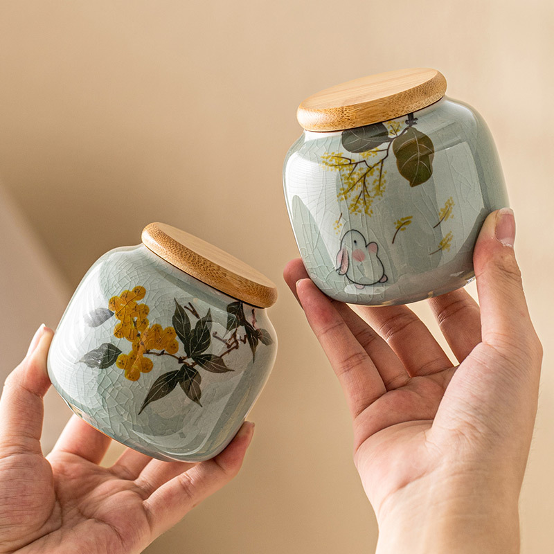 Bình trà borneol Ru Kiln bình gốm sứ mini cầm tay nhỏ bình đựng trà xanh đỏ Pu'er bình rỗng