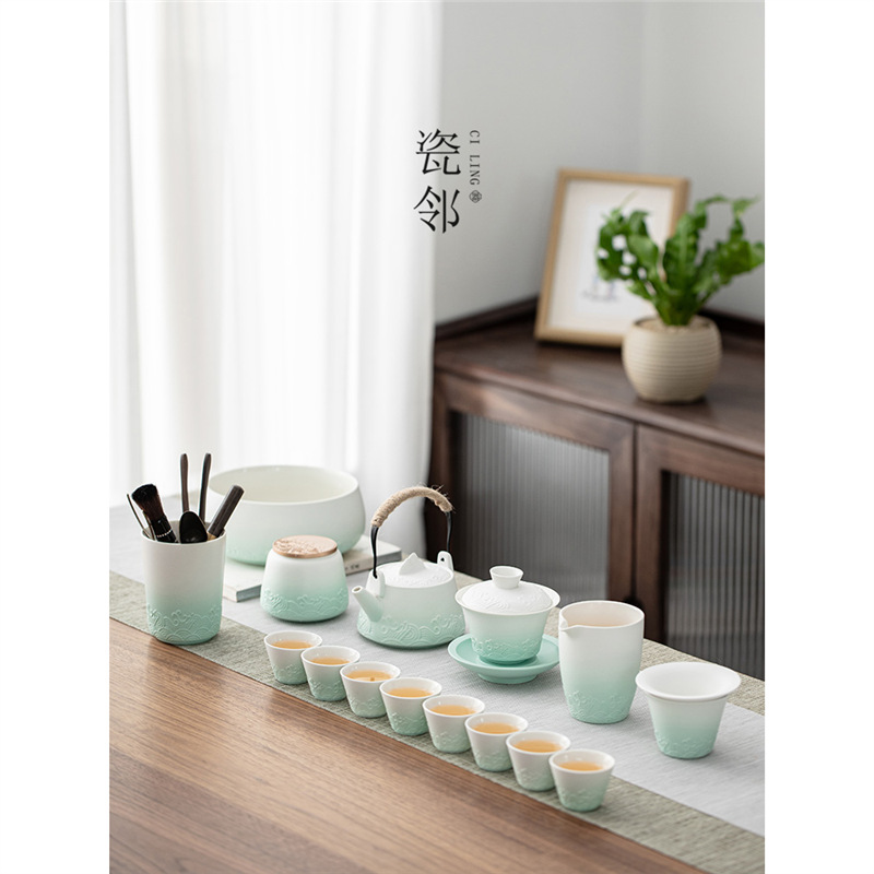 Bộ dụng cụ pha trà Kung Fu Bộ dụng cụ pha trà chạy văn phòng gia dụng bằng gốm sứ tay cầm bên nắp bát cốc trà trọn bộ hộp quà bán buôn