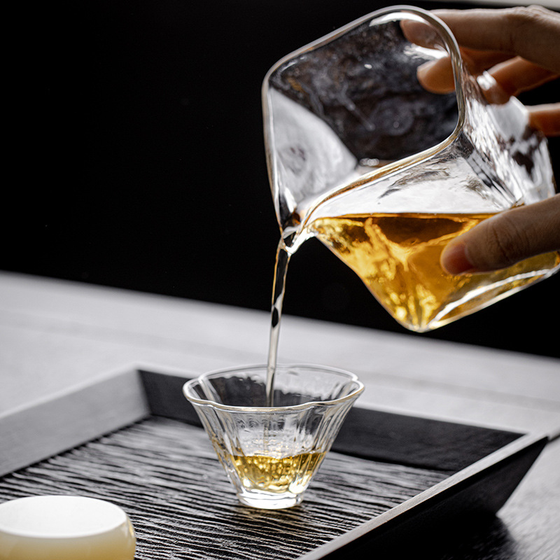 Cốc trà thủy tinh cốc nhỏ chịu nhiệt cao Borosilicate cốc trà dày cốc cánh hoa gia dụng cốc Chủ Bộ trà Kung Fu