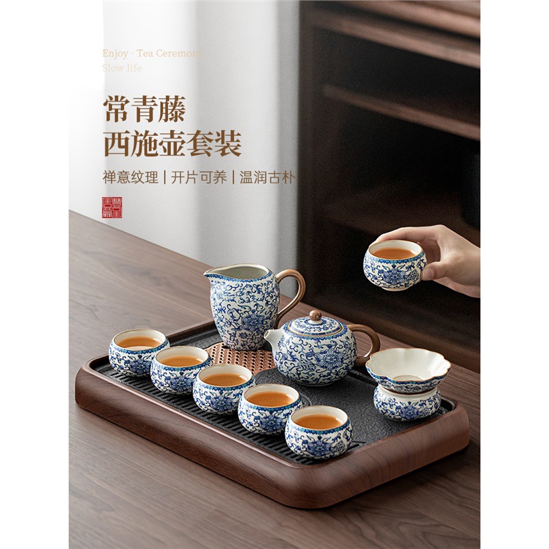 Bộ ấm trà gốm sứ trắng xanh bộ bàn trà nhỏ gia dụng chuyên dụng pha trà mẫu mới 2025 bộ cao cấp nhẹ nhàng