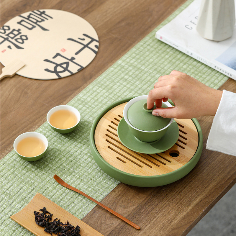 Bộ ấm trà Kung Fu hai cốc Xiaoqingxinyiqing kiểu Trung Quốc gia dụng cao cấp văn phòng họp bàn trà nắp bát bán buôn