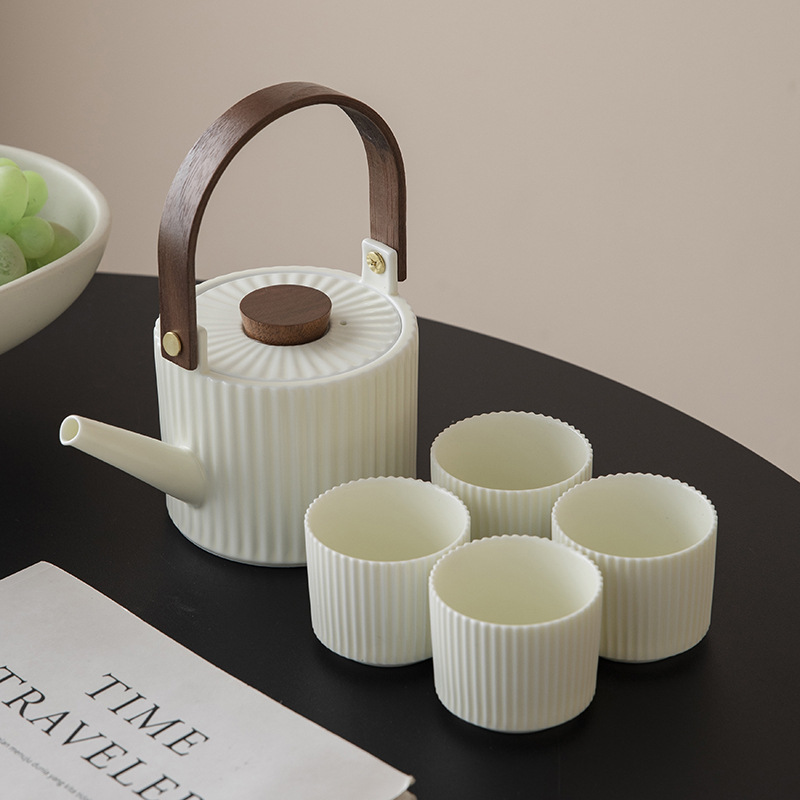 Bộ dụng cụ pha trà Kung Fu đơn giản sang trọng nhẹ nhàng gia dụng ấm chén trà bộ nhỏ pha trà văn phòng tiếp khách gốm sứ
