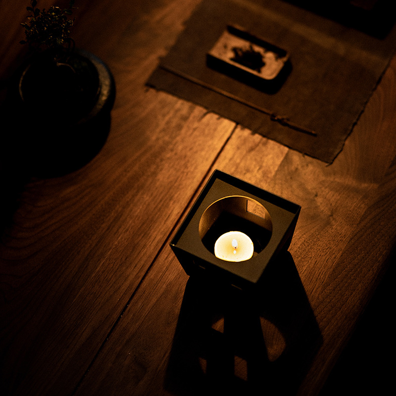 Nhà sản xuất bán buôn ấm trà sắt rèn ấm trà ấm rượu ấm ấm trà Chân nến rượu đế đèn cồn đế bếp trà nhỏ cách nhiệt gia dụng