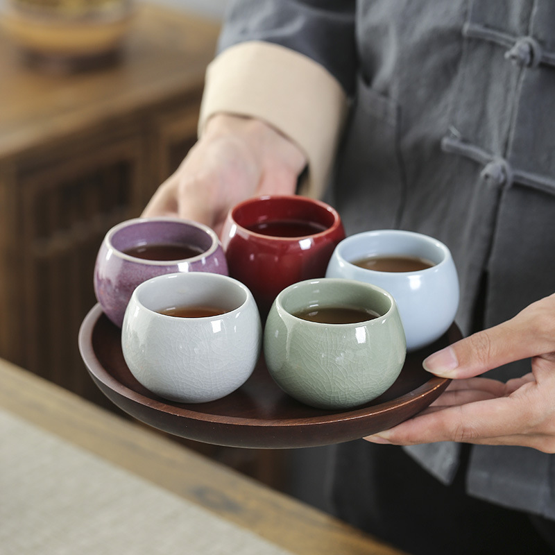 Bộ ấm chén trà quà tặng với năm lò nổi tiếng: chén nếm, chén chủ, lò Ru gốm, lò Ge, lò Jun, chén trà Kung Fu để uống trà.