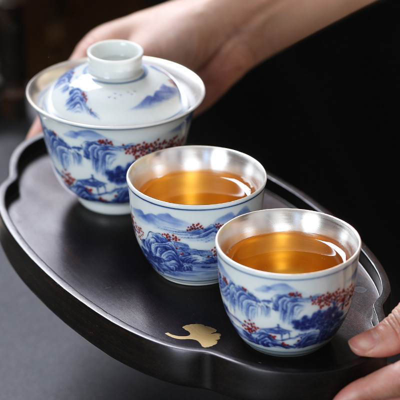 Ấm pha trà cầm tay gia dụng Bộ trà Kung Fu 999 bạc sterling một bình hai cốc bộ trà du lịch xách tay gốm sứ