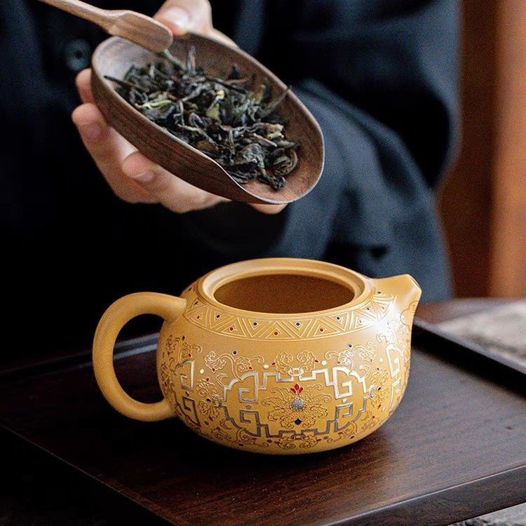 Ấm đất sét màu tím phần vàng ấm Fengming ấm Xi Shi ấm trà tráng men Đôn Hoàng ấm trà đơn bộ ấm trà tử sa đích thực