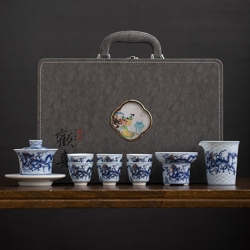 Bộ ấm trà Kung Fu Tenglong màu xanh và trắng gia dụng cổ điển không nóng tay cốc trà ba tài năng hộp quà cao cấp bán buôn