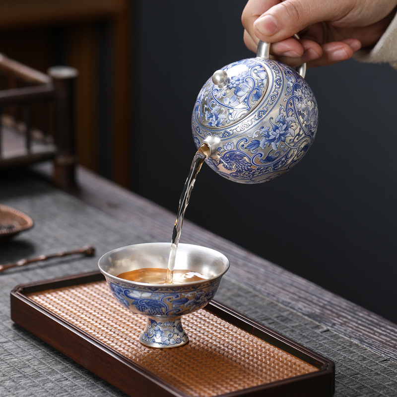Di động xách tay du lịch 999 sterling bạc ấm chén gốm sứ trắng xanh hoa văn văn phòng quà tặng bộ trà quốc triều năm Nhâm Thìn